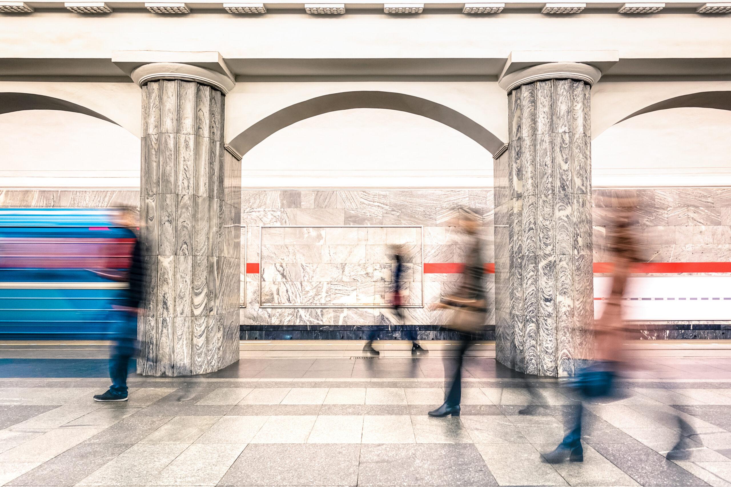 People walking on generic platform of underground subway metro s